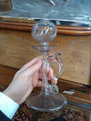 Lot 266 - A group of four open flame 'lacemaker' type glass oil lamps
