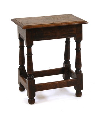 Lot 306 - An 18th century oak stool