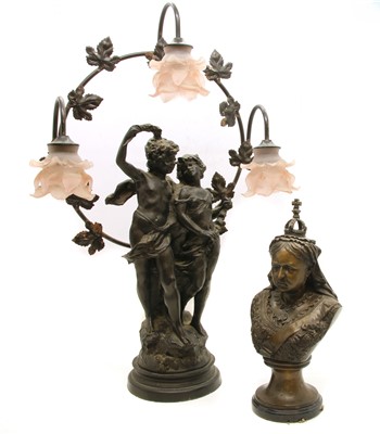 Lot 197 - A large Victorian figural spelter three light lamp