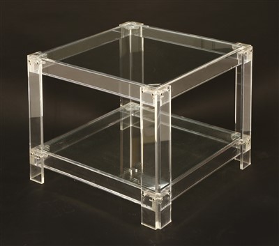Lot 542 - A lucite and glass side table