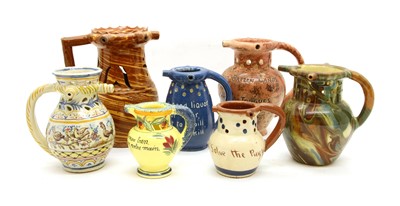 Lot 195 - A collection of ceramic puzzle jugs