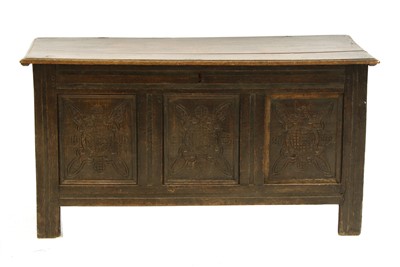 Lot 343 - An 18th Century oak three panelled coffer