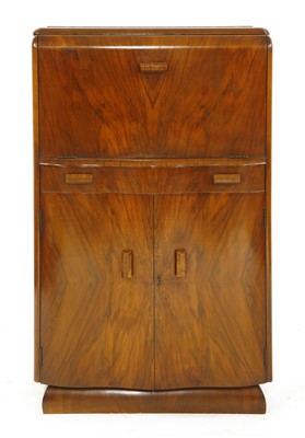 Lot 303 - An Art Deco walnut cocktail cabinet
