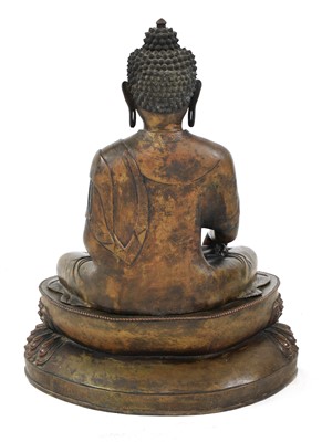 Lot 384 - A Chinese bronze shakyamuni Buddha
