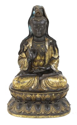 Lot 638 - A Chinese bronze Guanyin