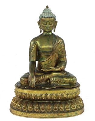 Lot 387 - A Chinese bronze shakyamuni Buddha
