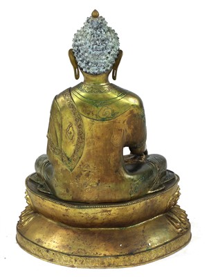 Lot 387 - A Chinese bronze shakyamuni Buddha