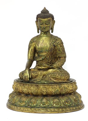 Lot 395 - A Chinese bronze shakyamuni Buddha