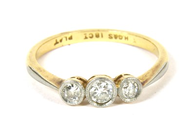 Lot 31 - A gold three stone diamond ring