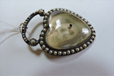 Lot 43 - A Victorian gold and silver, split pearl, padlock form brooch pendant