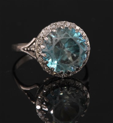 Lot 154 - A white gold blue zircon and diamond cluster ring
