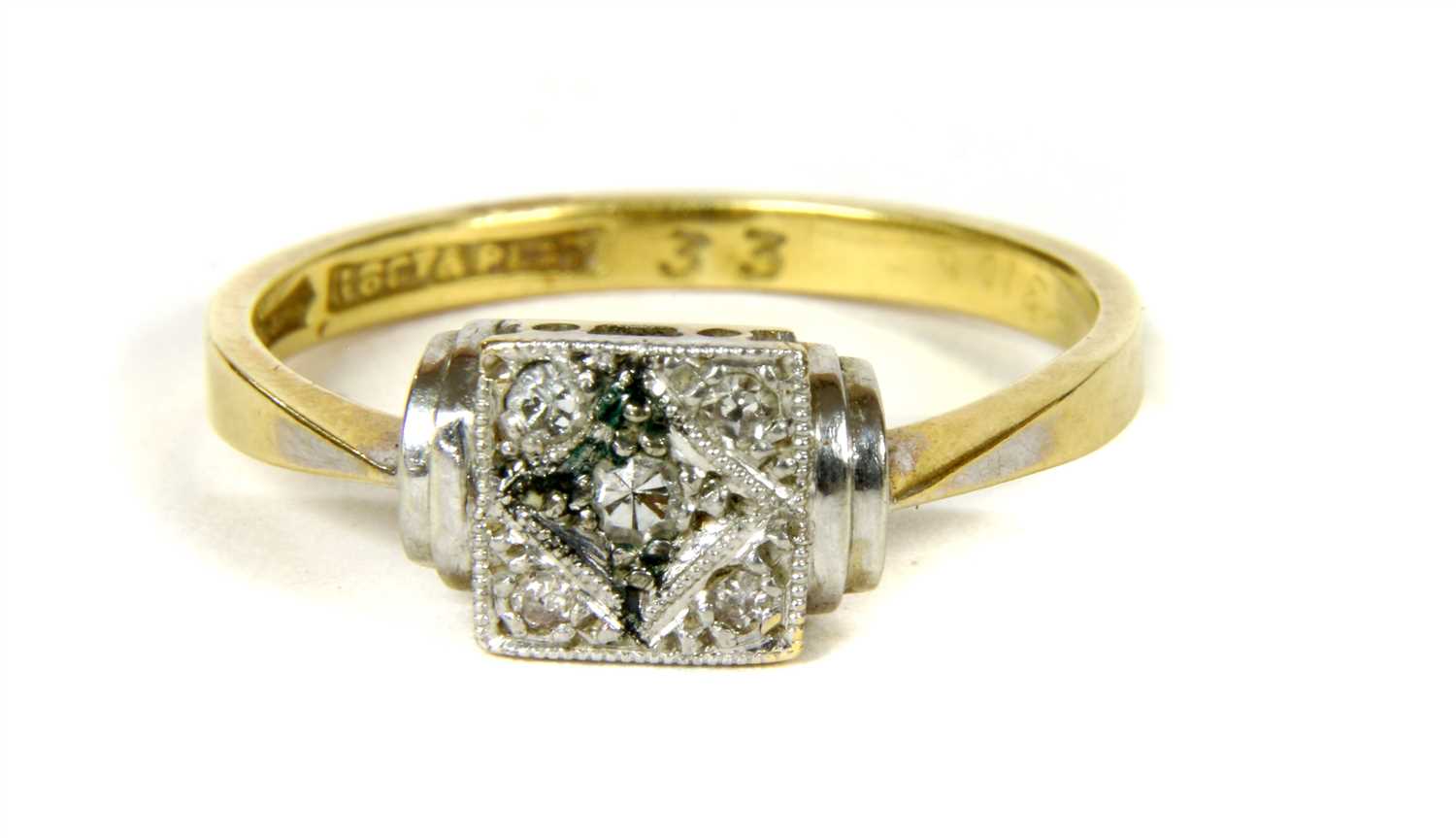 Lot 19 - An Art Deco five stone diamond ring