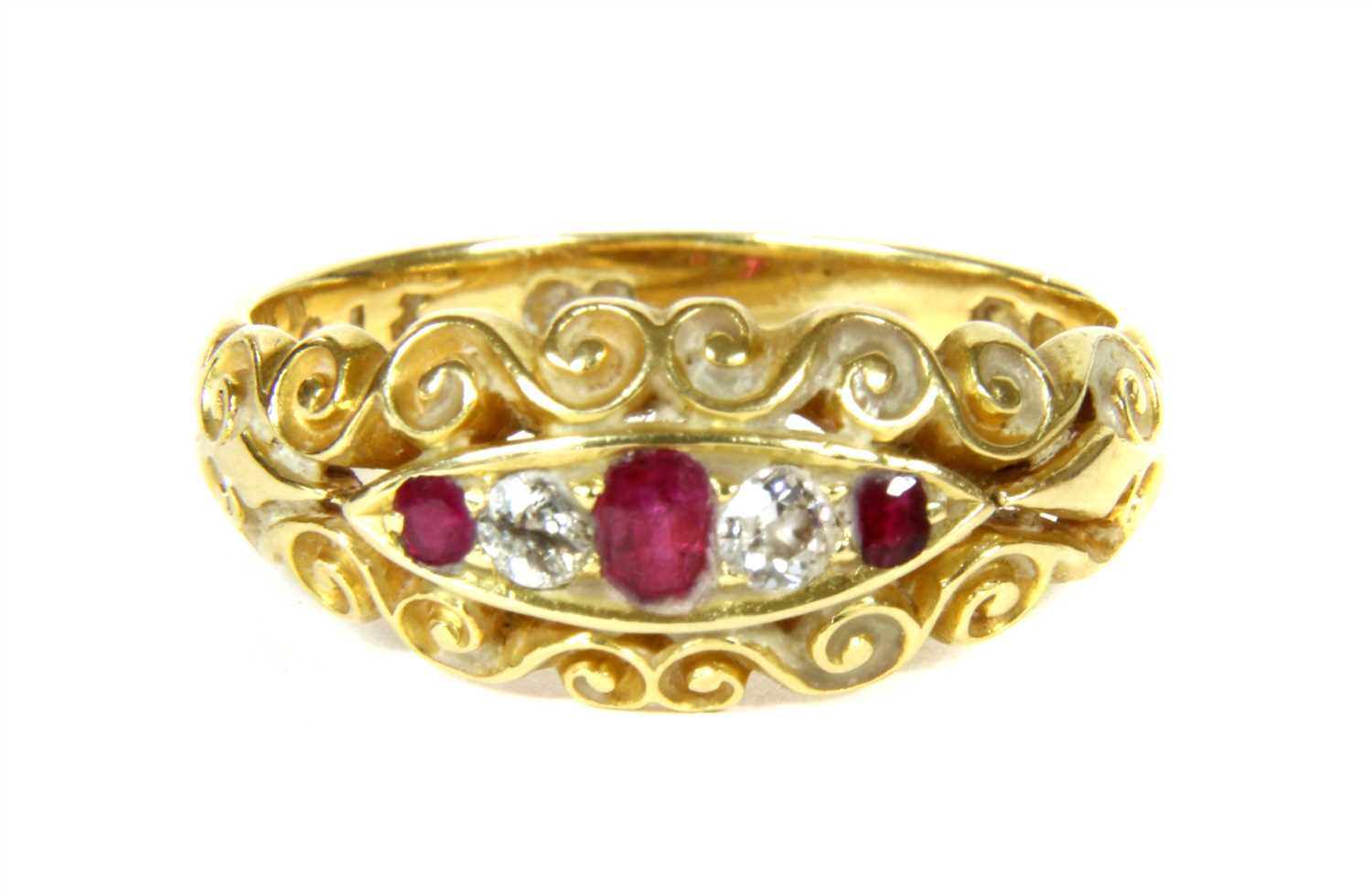 Lot 20 - A Victorian 18ct gold ruby and diamond five stone boat shaped ring