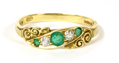 Lot 33 - An 18ct gold emerald and diamond five stone ring