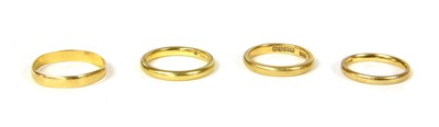 Lot 32 - Four 22ct gold wedding rings