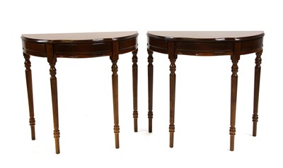 Lot 312 - A pair of George III style inlaid mahogany side tables