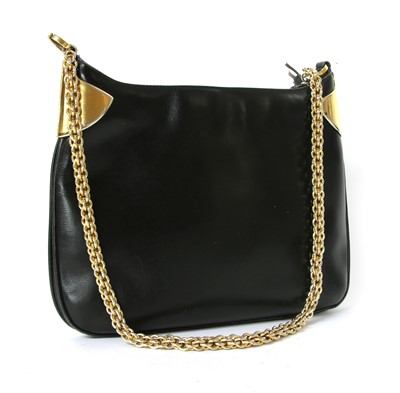 Lot 204 - A vintage Gucci black leather shoulder bag