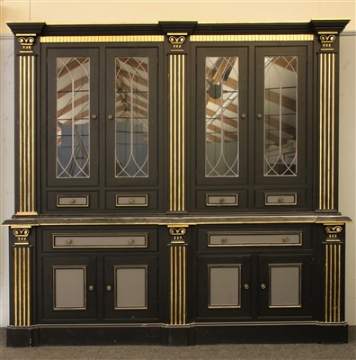 Lot 305 - A large ebonised and parcel gilt bookcase