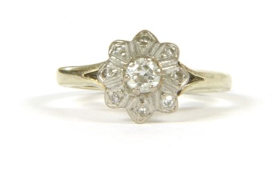 Lot 132 - A 9ct gold diamond set daisy cluster ring