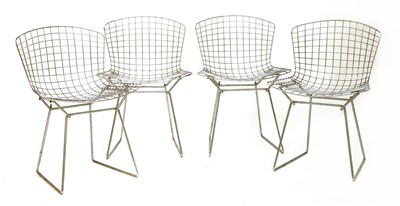 Lot 325 - A set of four chrome wire chairs