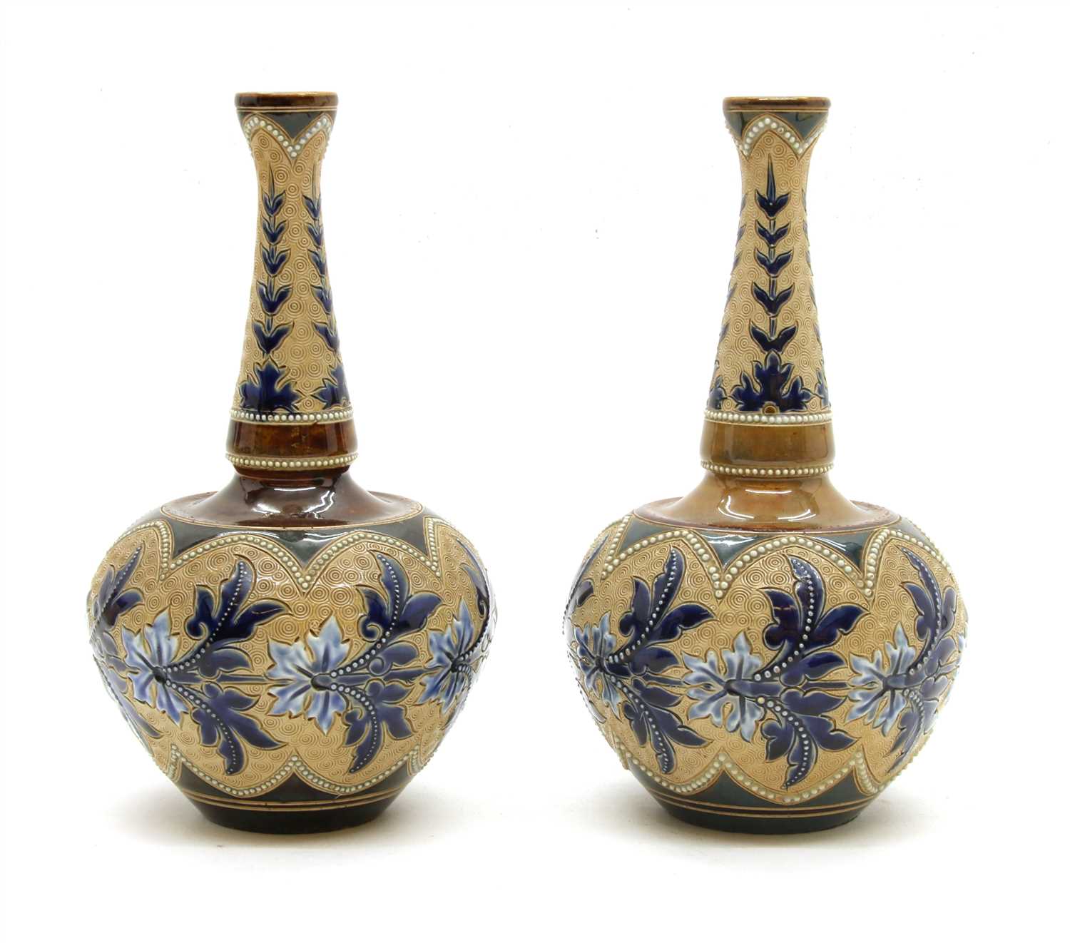 Lot 228 - A pair of Doulton Lambeth glazed stoneware bottle vases