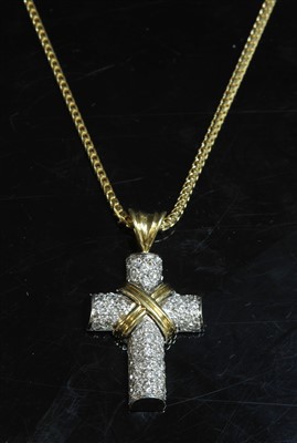 Lot 360 - An Italian two colour yellow and white gold diamond set cross and chain