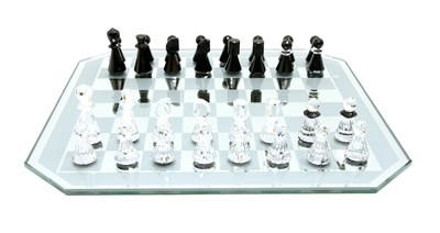 Lot 139A - A Swarovski crystal chess set