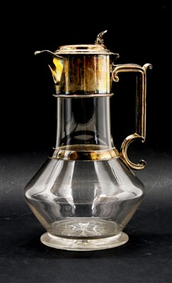 Lot 345 - A Victorian cut glass and silver mounted claret jug