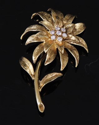 Lot 242 - An 18ct gold diamond set flower brooch, c.1970