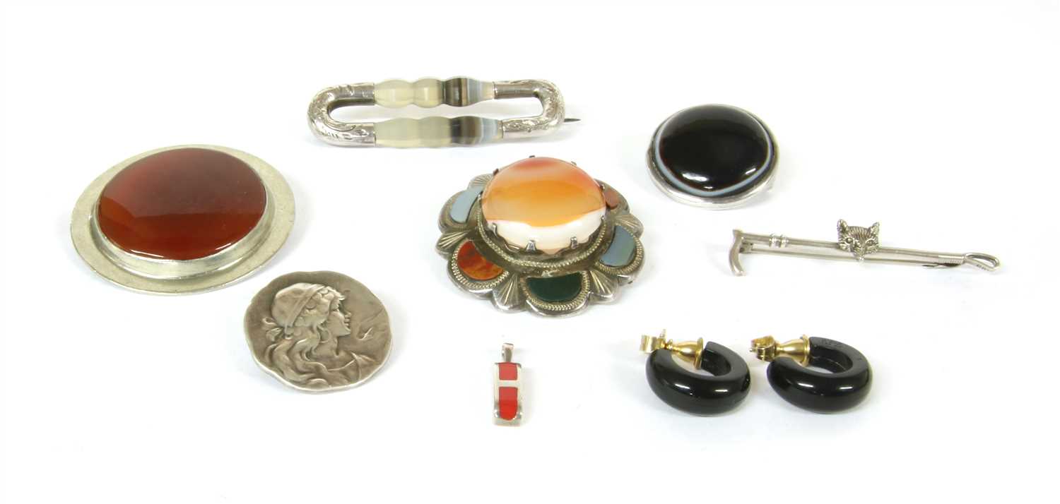 Lot 30 - A Victorian banded agate rectangular openwork brooch