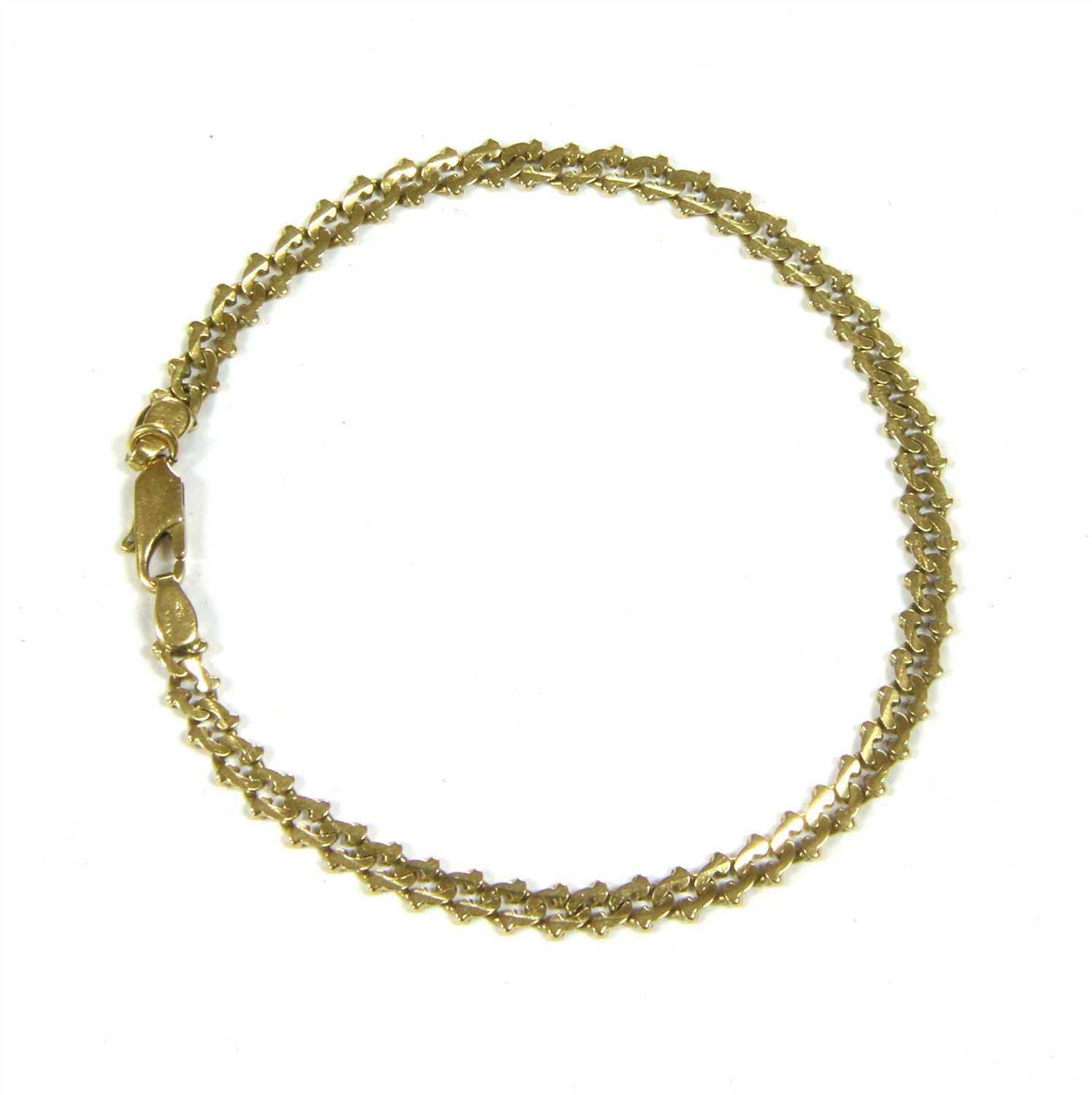 Lot 118 - An Italian gold curb chain bracelet