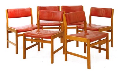 Lot 312 - A set of six oak dining chairs
