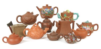 Lot 475 - A collection of twelve Chinese Yixing Zisha teapots and covers