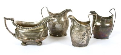 Lot 322 - A George III silver cream jug