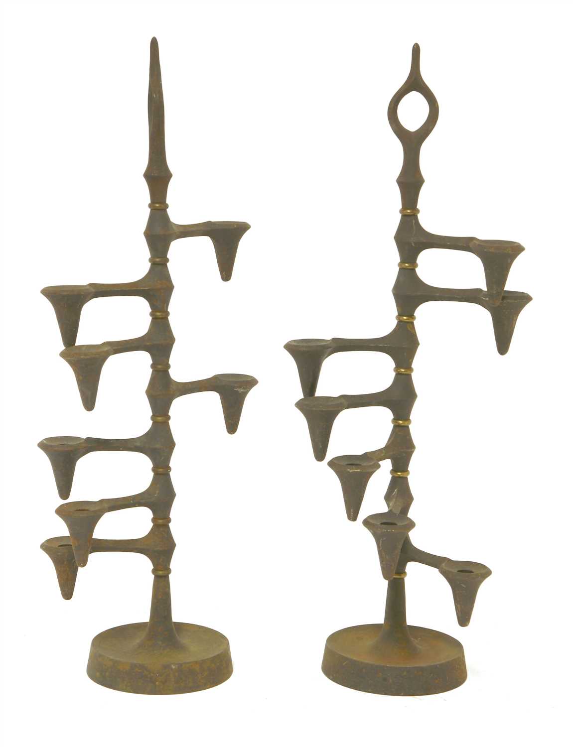 Lot 394 - A pair of cast iron candle trees