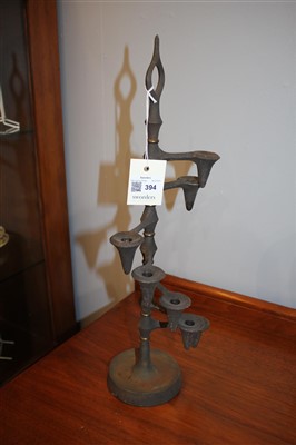 Lot 394 - A pair of cast iron candle trees
