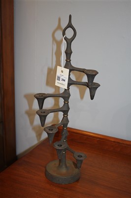 Lot 394 - A pair of cast iron candle trees