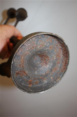Lot 394 - A pair of cast iron candle trees