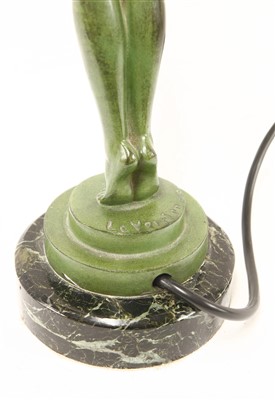 Lot 97 - An Art Deco-style patinated spelter table lamp