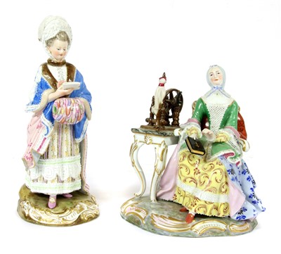 Lot 383 - A Meissen figure of a lady, in a Bonnet holding a muff, incised 'D 66', 20.5cm