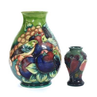 Lot 367 - A Moorcroft tubelined decorated 'Finches & Fruit' pattern baluster vase