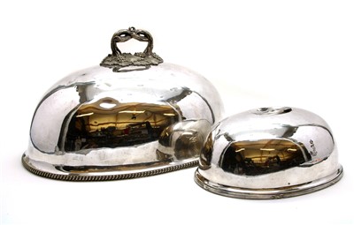 Lot 479 - Two silver plated meat dish covers