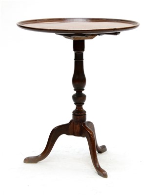 Lot 1611 - A George III circular mahogany tripod table