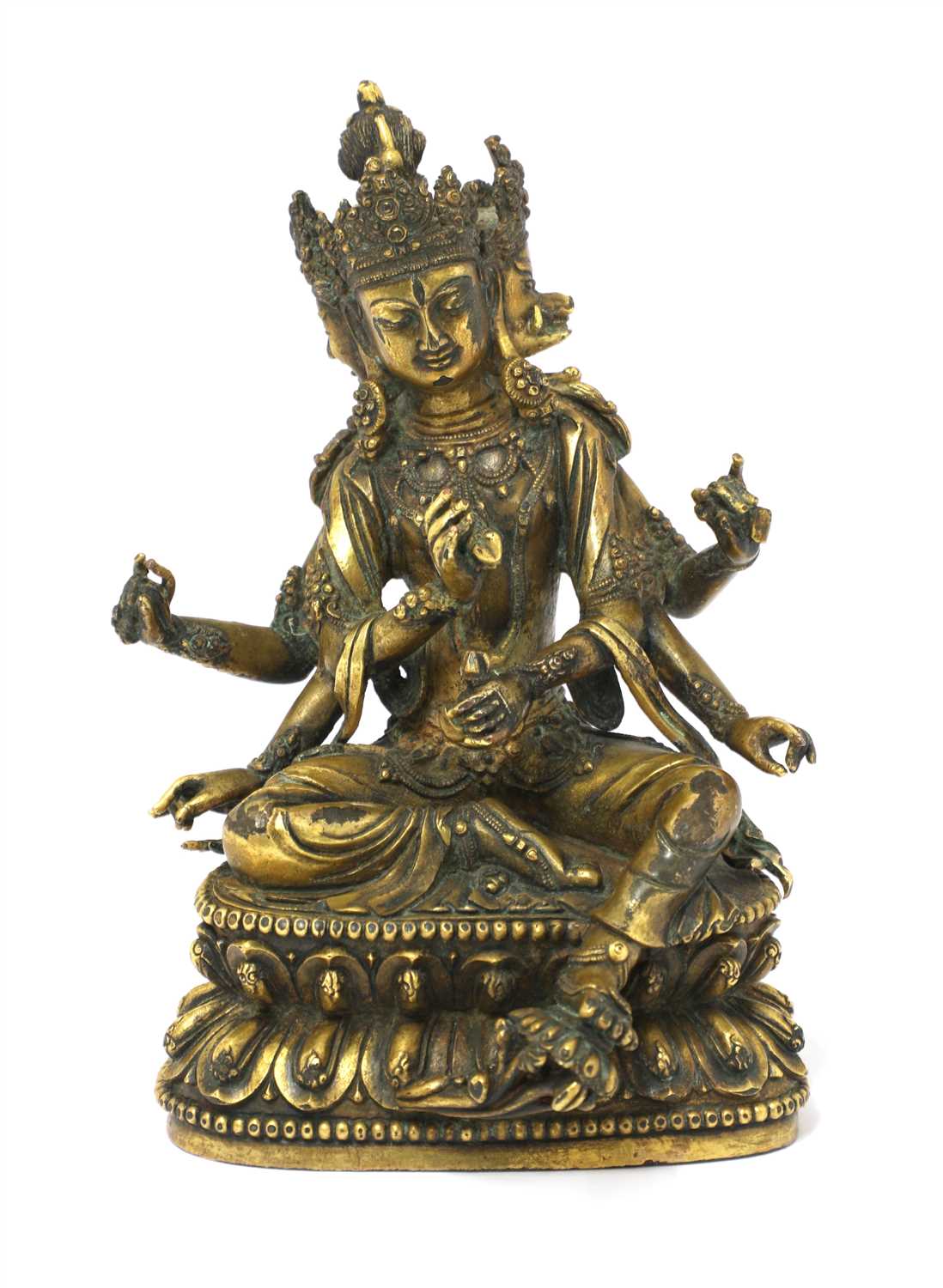 Lot 122 - A Tibetan gilt bronze bodhisattva
