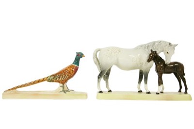 Lot 381 - A Beswick grey mare and foal