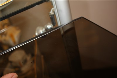 Lot 401 - An octagonal glass coffee table