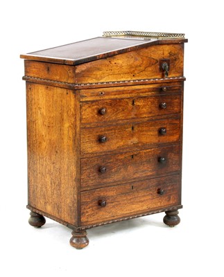 Lot 778 - A narrow Regency period rosewood davenport desk