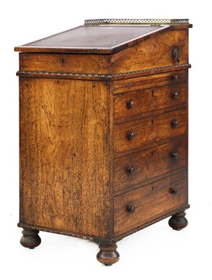 Lot 778 - A narrow Regency period rosewood davenport desk