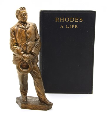 Lot 237 - A bronze standing figure of Cecil Rhodes, and a biography