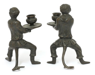Lot 192 - A pair of Italian bronze candlesticks